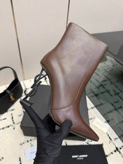 YSL 26S YSL LOGO HEEL ANKLE BOOTS 100 MM IN BROWN CALFSKIN