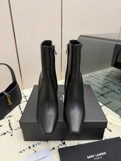 YSL 26S YSL LOGO HEEL ANKLE BOOTS 100 MM IN BLACK CALFSKIN