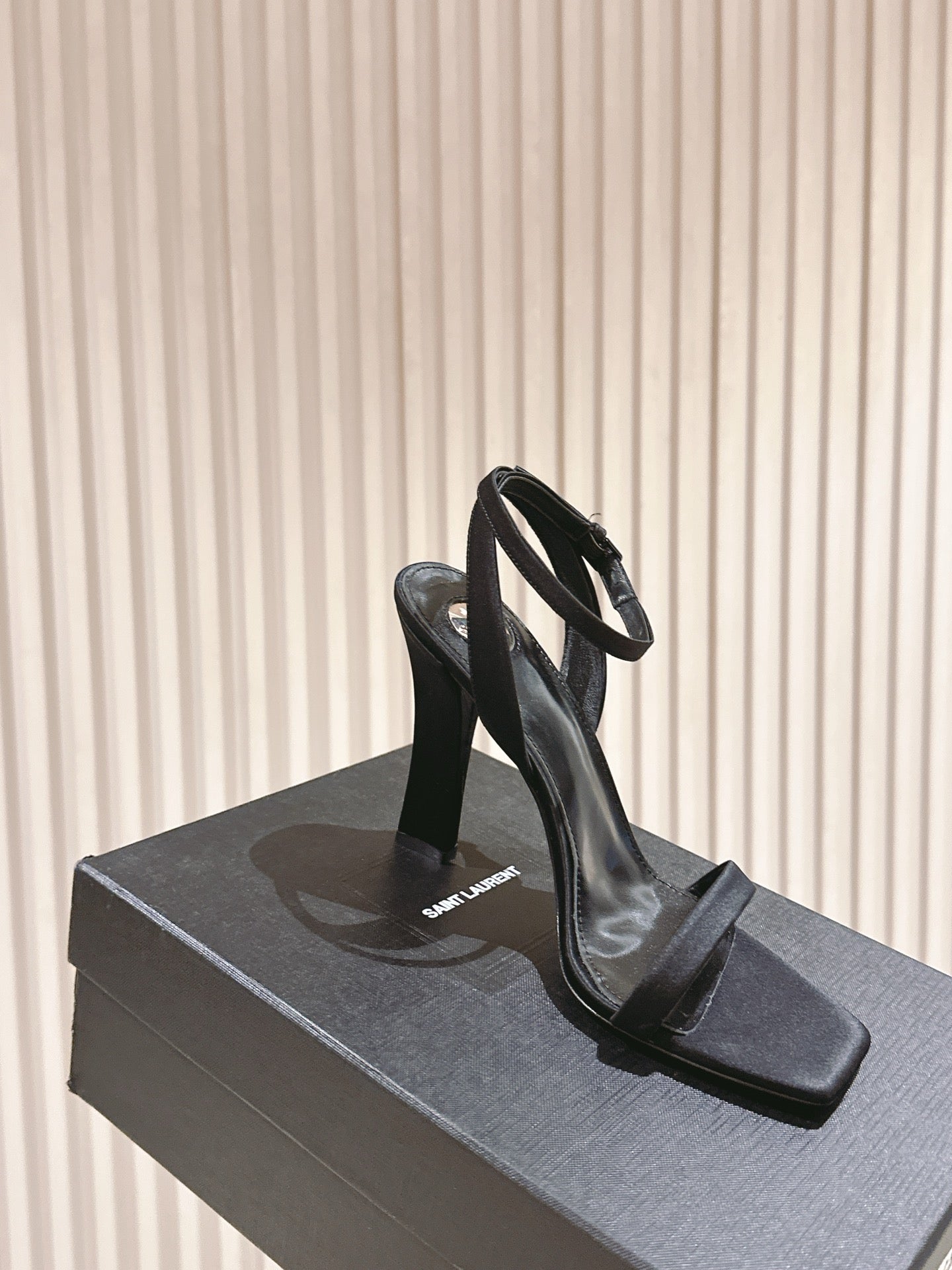 YSL 25S HIGH-HEEL SANDALS 100 MM IN BLACK SATIN