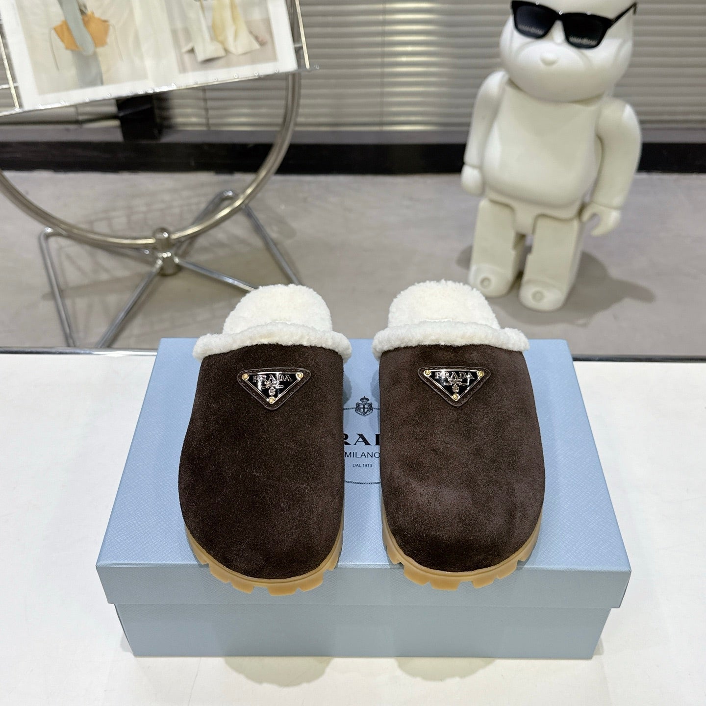 PRADA 25S FUR-LINED MULES IN DARK BROWN SUEDE