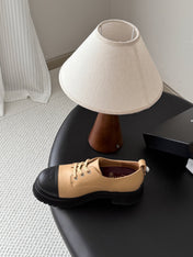 CHANEL 26S LACE UP PLATFORM IN BLACK AND BEIGE CALFSKIN