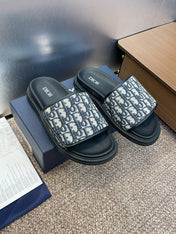 DIOR 25S ALIAS SLIDES IN BLACK CALFSKIN WITH CD OBLIQUE DEEP BLUE LOGO